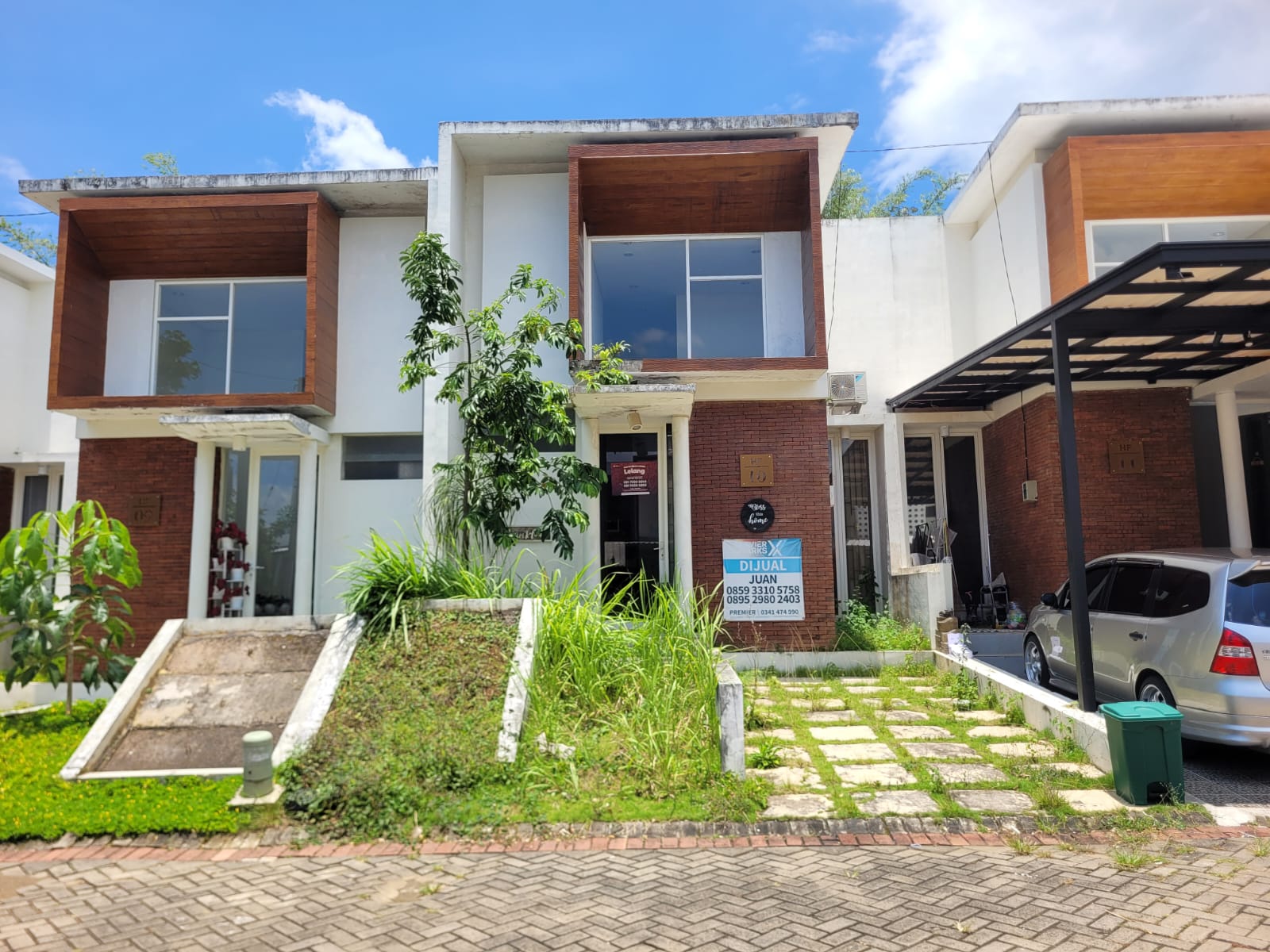 AGUNAN LELANG RUMAH